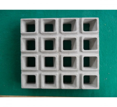 Bloco de tijolo vazado.